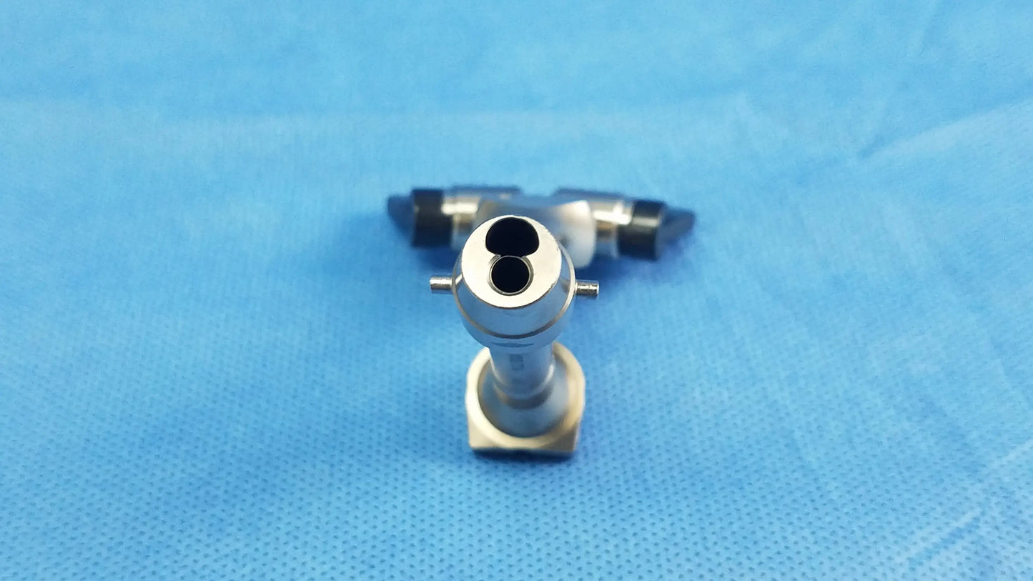 Silver surgical telescope cysto bridge with dual circular openings and hexagonal base compatible olympus model a20977a