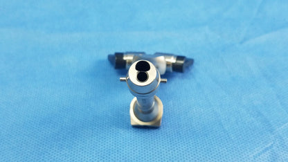Silver surgical telescope cysto bridge with dual circular openings and hexagonal base compatible olympus model a20977a