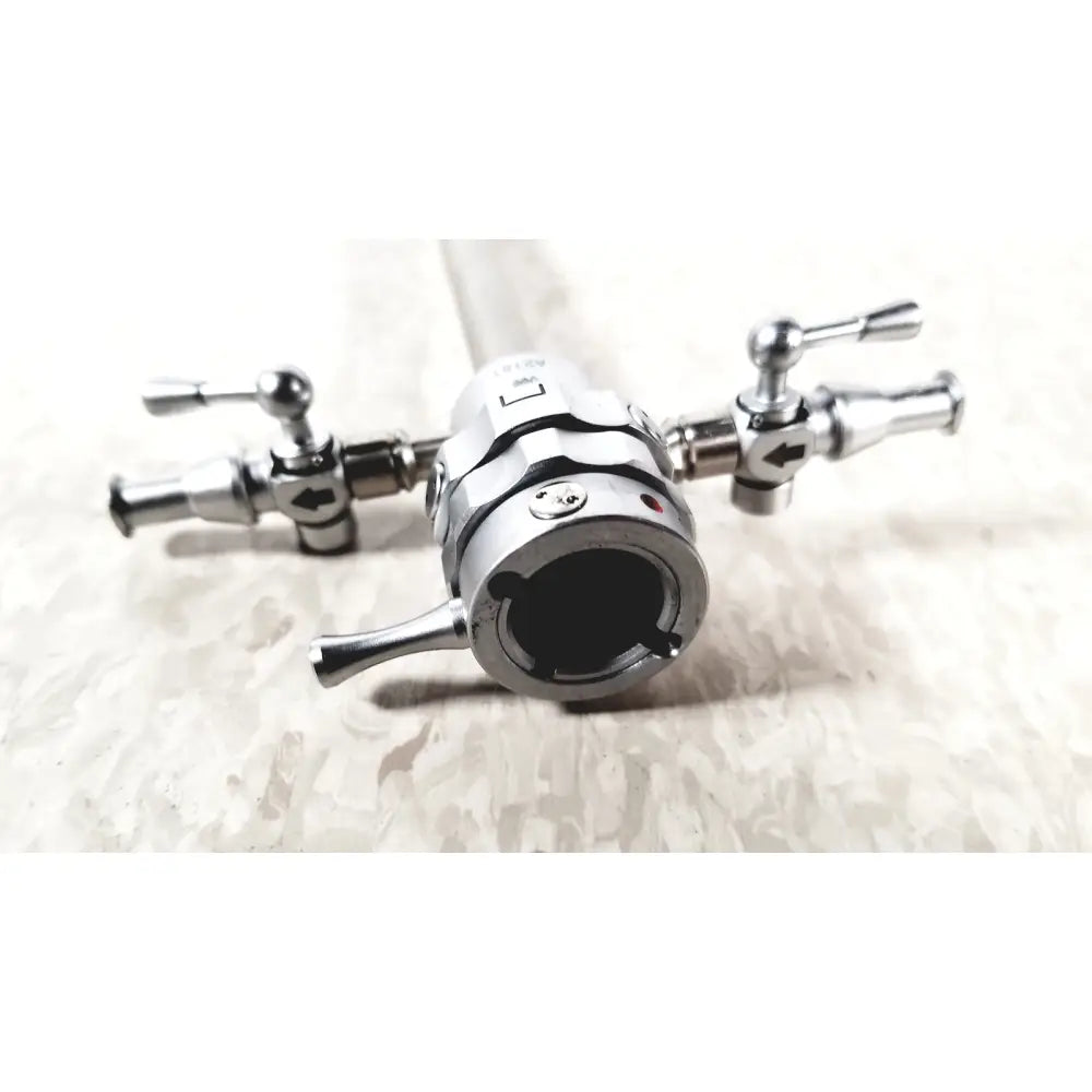 Silver-colored olympus a2181 endoscope with multiple control knobs and central viewing port featuring 27fr sheath
