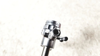 Silver metallic olympus a2181 endoscope sheath tripod head with matte finish and engraved branding for precise use