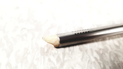 A sleek metallic olympus a2181 endoscope sheath with small ventilation holes and a worn wooden tip in 27fr size