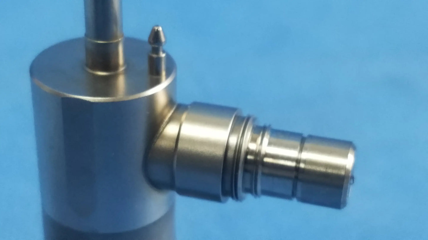 Shiny metallic cylindrical valve with threaded connection and two ports for compatible olympus cystoscopic a22000a systems