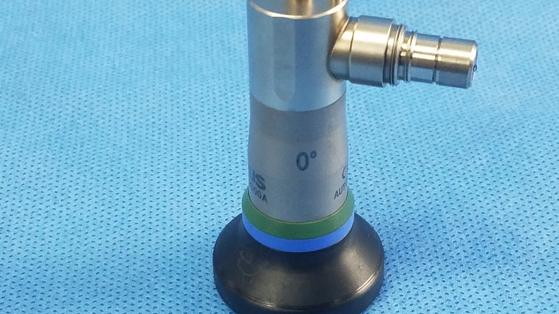 Silver olympus a22000a autoclave cystoscope 0 degree with black rubber base and angled connection port compatible olympus cystoscopic systems