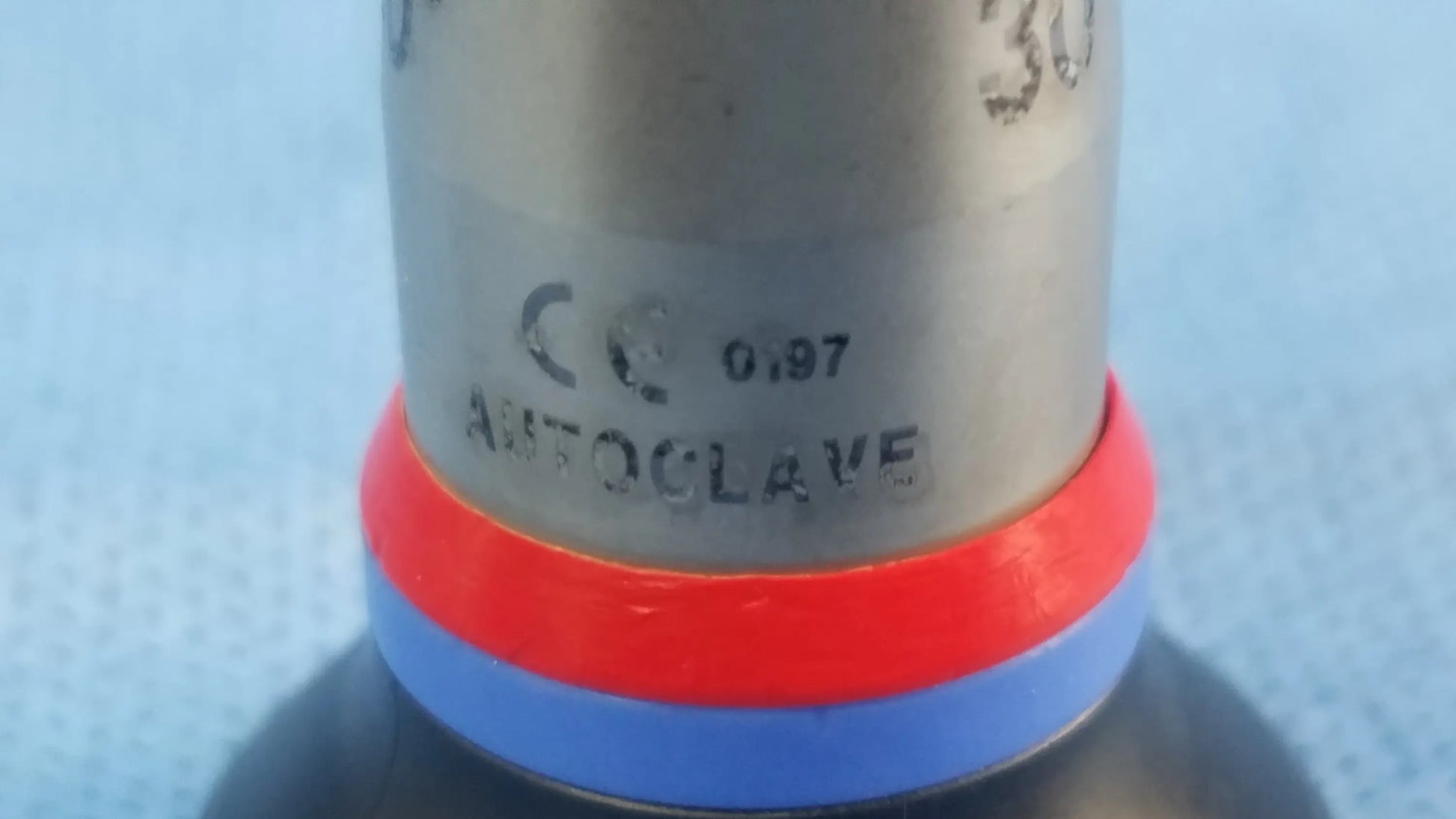 Silver metallic a22002a autoclave valve with red and blue sealing rings compatible with olympus cystoscopic systems