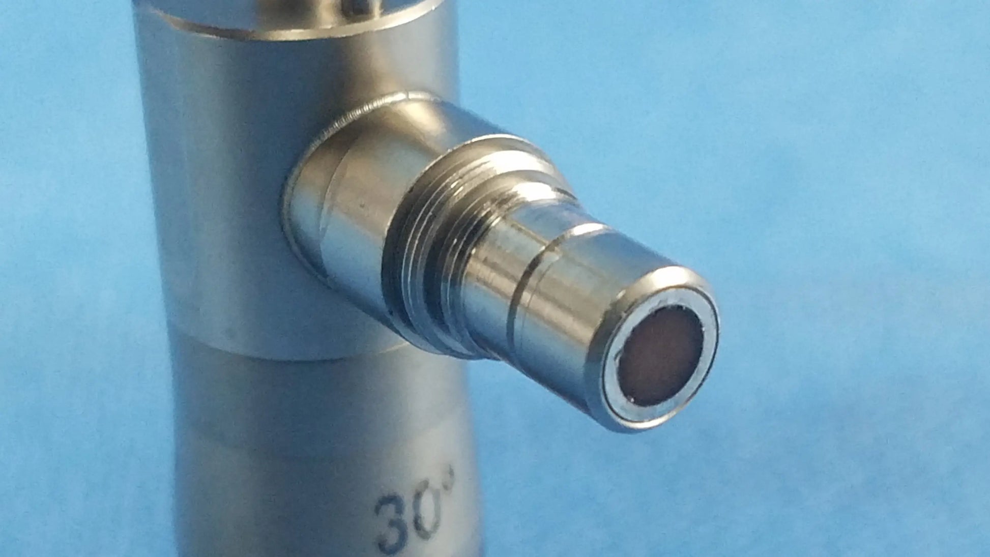 Silver metallic autoclavable cystoscope with 30 degree angled connector and threaded fittings for compatible Olympus cystoscopic systems A22002A