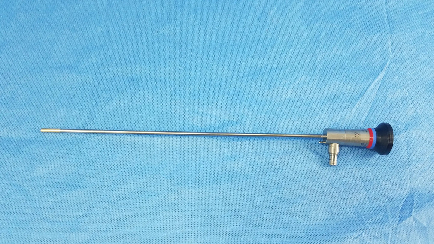 Silver surgical endoscope with black and red capped tip compatible with olympus cystoscopic systems a22002a model