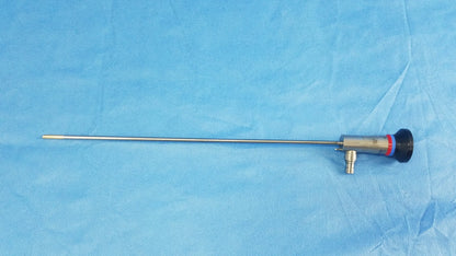 Silver surgical endoscope with black and red capped tip compatible with olympus cystoscopic systems a22002a model