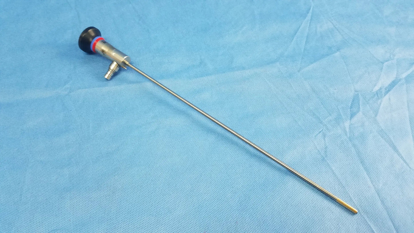 Silver surgical endoscope with black and red handle and long metallic shaft compatible with Olympus cystoscopic A22002A systems
