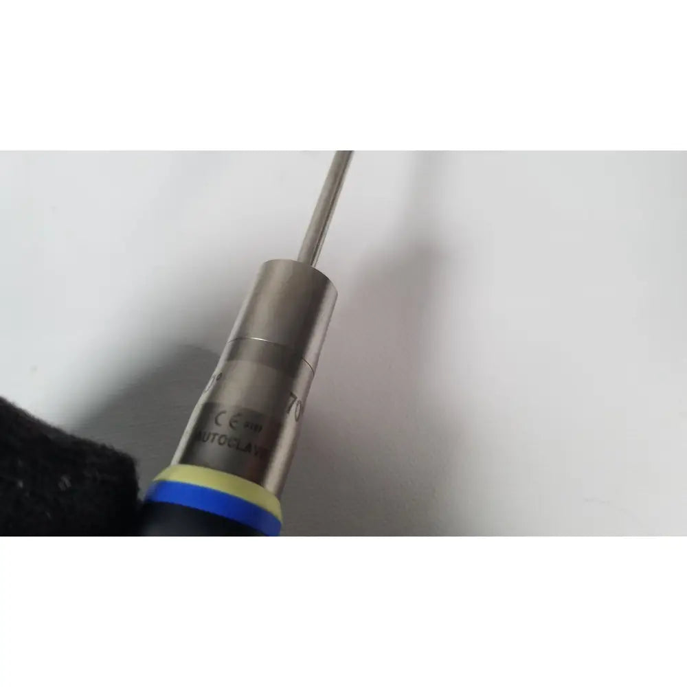 Silver metallic olympus a22003a 4mm 70 degree scope probe with blue and yellow bands labeled autocлав on its surface