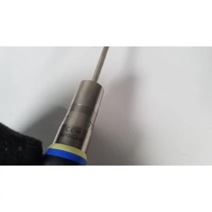 Silver metallic olympus a22003a 4mm 70 degree scope probe with blue and yellow bands labeled autocлав on its surface