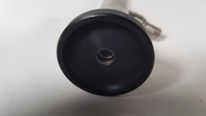 Black rubberized base with central hole and metallic connector of olympus a22003a 4mm 70 degree scope back view