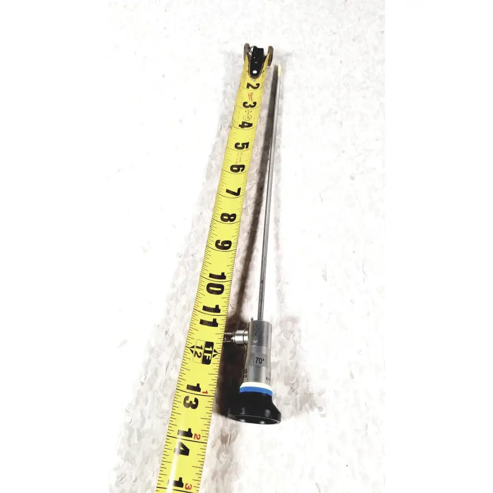A metallic olympus a22003a 4mm autoclavable cystoscope with slender shaft and black-tipped base with blue ring
