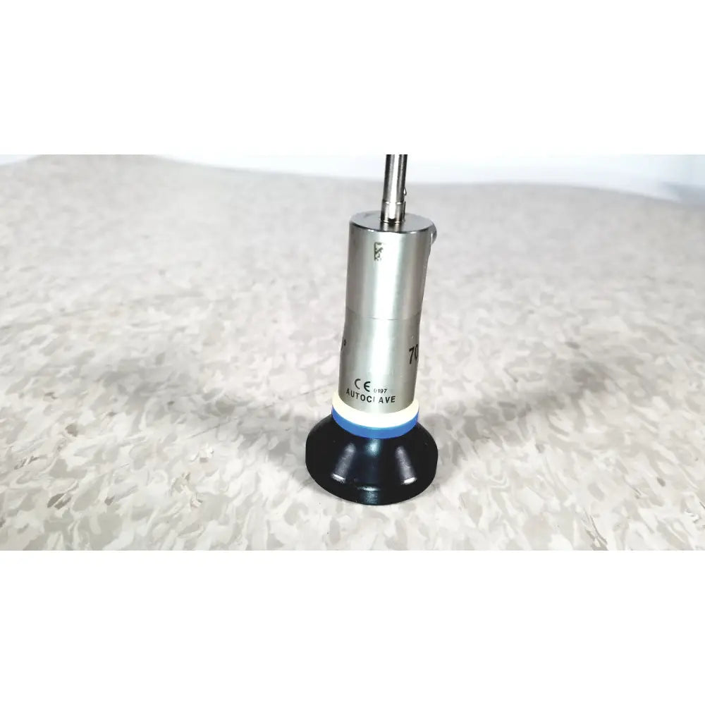 Silver metallic olympus a22003a 4mm autoclavable cystoscope with black base and blue accent ring labeled autocave