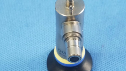 Silver-colored rigid scope with black rubber base and yellow accent ring compatible with Olympus endoscopic systems