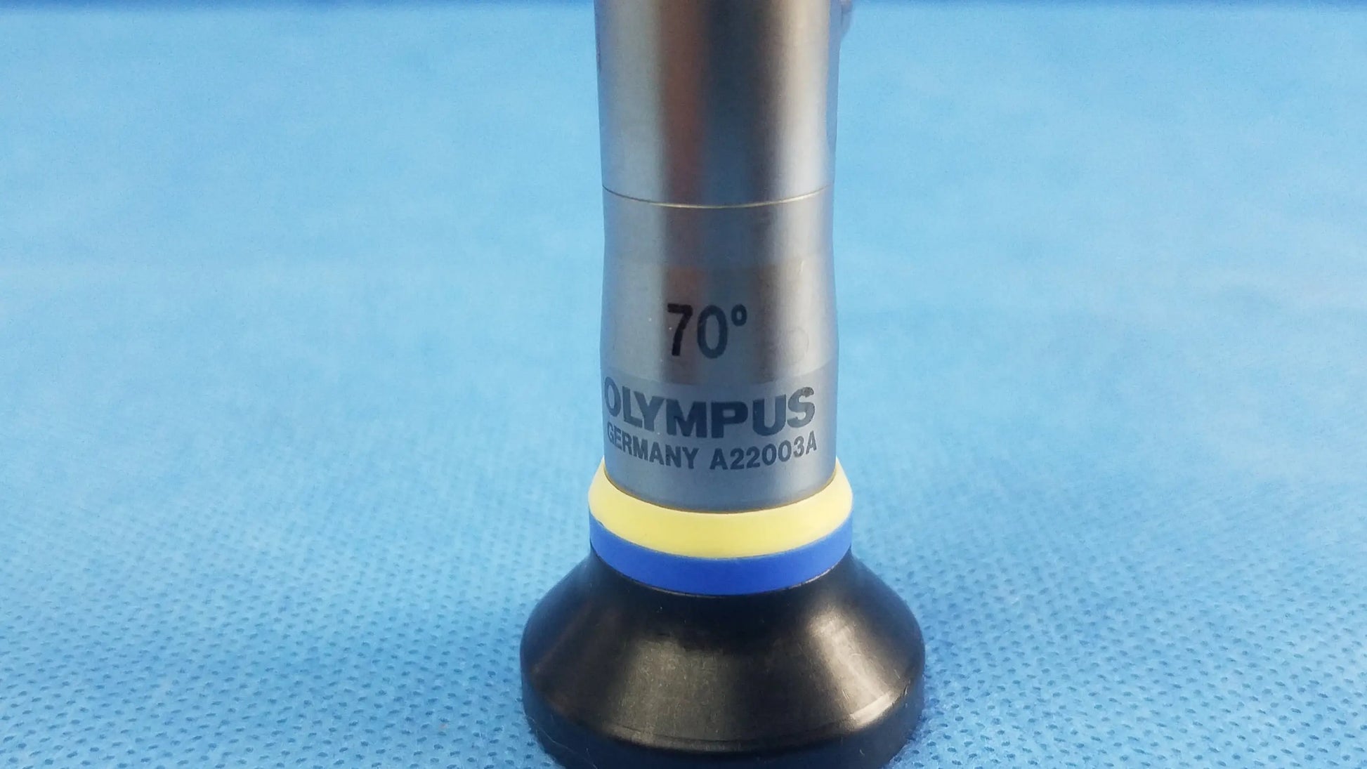 Silver Olympus A22003A rigid scope with 70-degree angled tip, black rubber base, yellow-blue rings for Olympus endoscopic systems