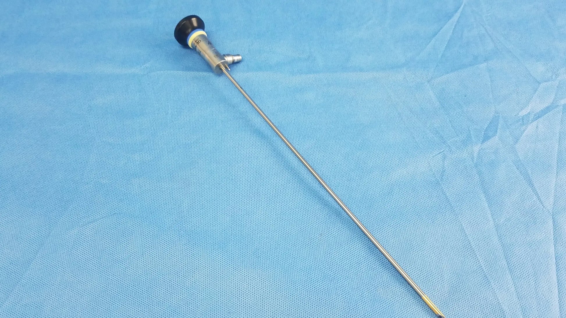 Silver rigid scope with black-tipped handle and metallic shaft compatible with Olympus endoscopic systems model A22003A 70º degree