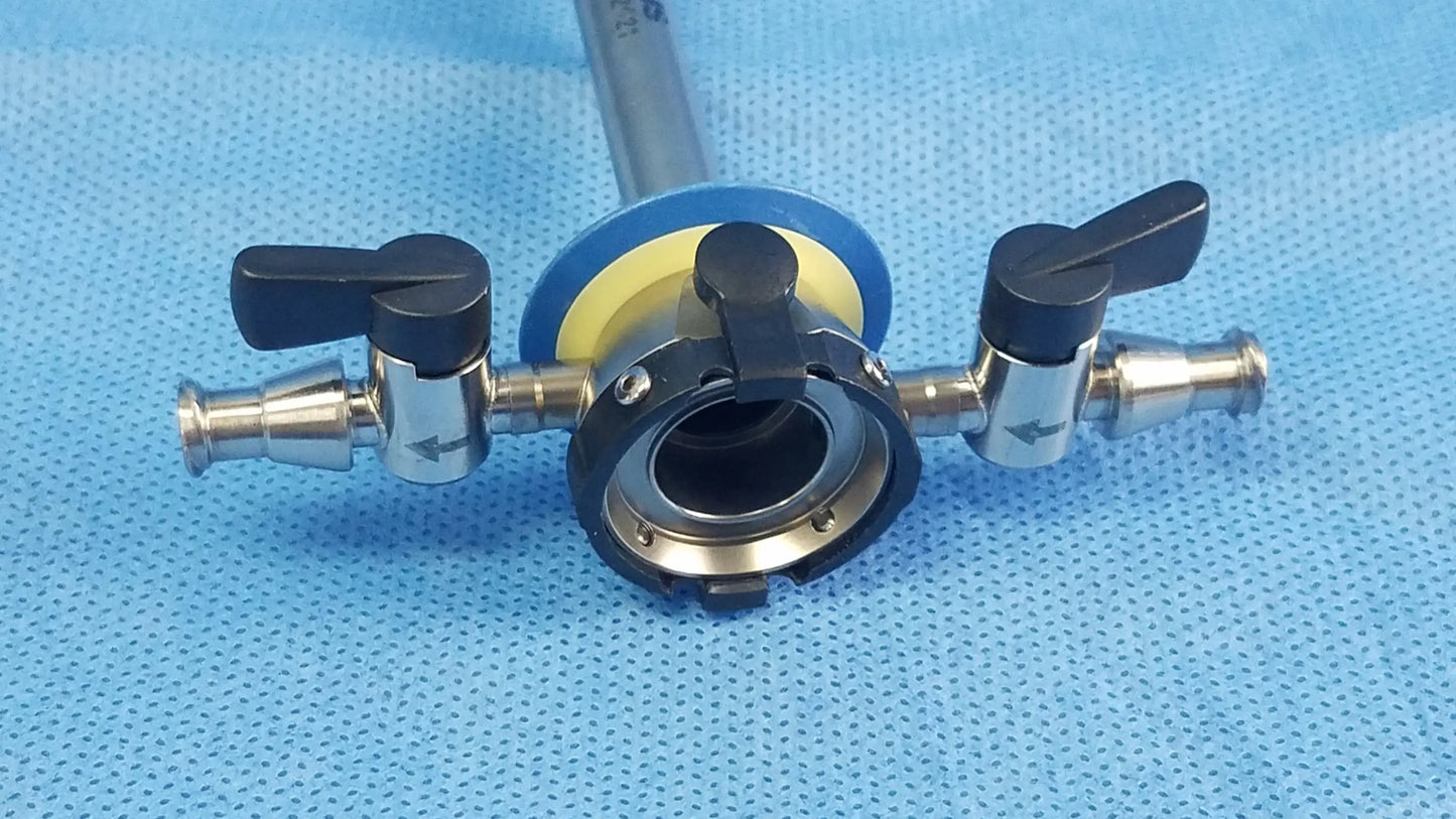 Olympus A22021A rotatable outer sheath 27 Fr with central circular port and black-handled valves on metallic arms