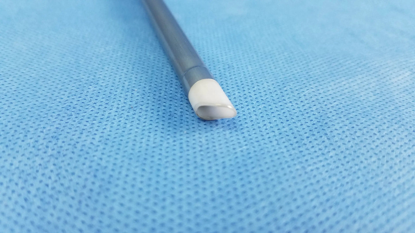 Gray cylindrical medical catheter with white tapered tip, an instrument component for olympus hysteroscopic resectoscope systems