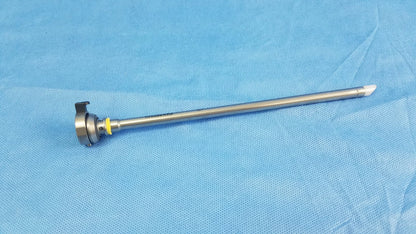 Silver metallic hysteroscopic resectoscope inner sheath with yellow ring and white tip for resectoscope systems instrument component