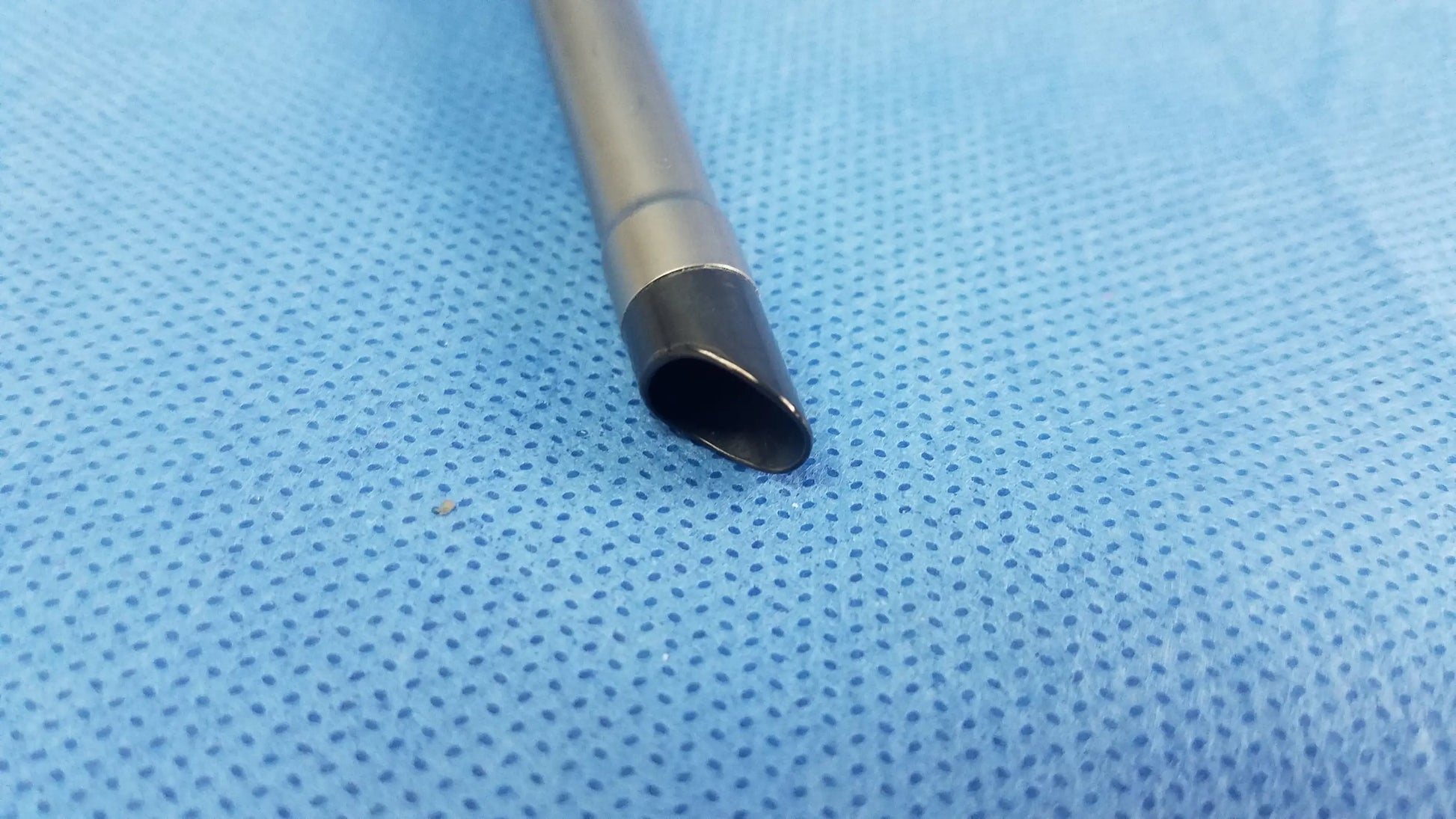 Olympus A22042A silver resection sheath with black-tipped endoscopic instrument component and smooth metallic finish