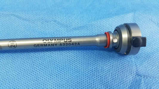 Silver-colored olympus a22042a resection sheath with metallic shaft black knob and red o-ring endoscopic instrument component