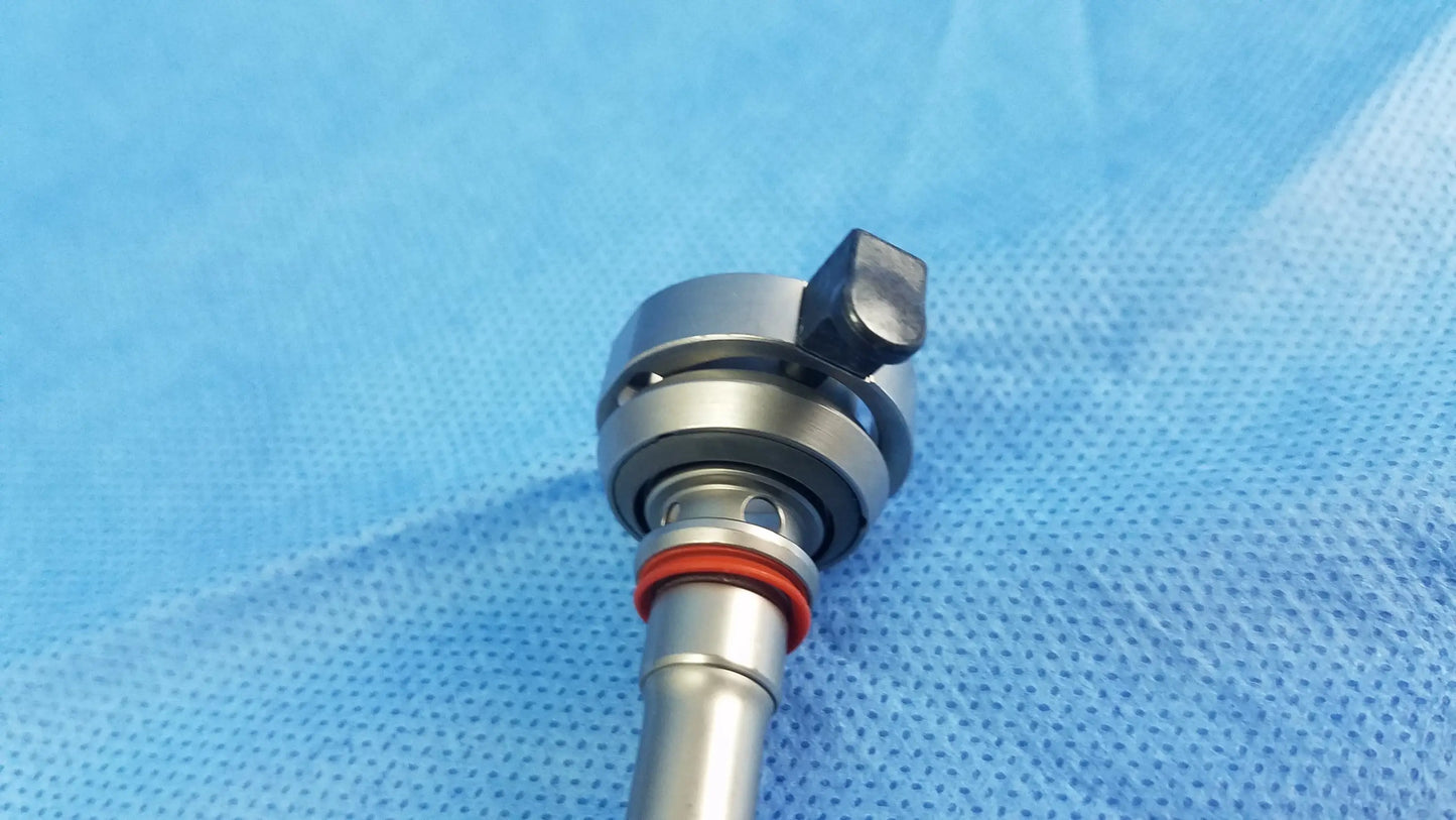 Silver olympus a22042a resection sheath with black adjustment knob and red o-ring endoscopic instrument component