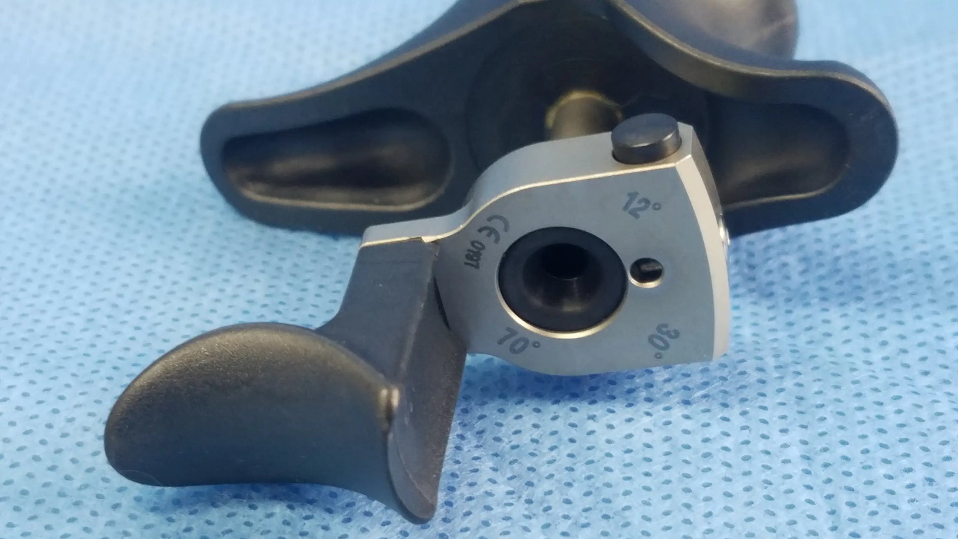 Silver and black Olympus A22071A visual optical obturator with adjustable angle markings 12° 30° 70° on surgical instrument