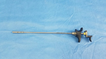 Olympus a22071a silver visual optical obturator with black ergonomic handles and yellow accent for precise surgical use