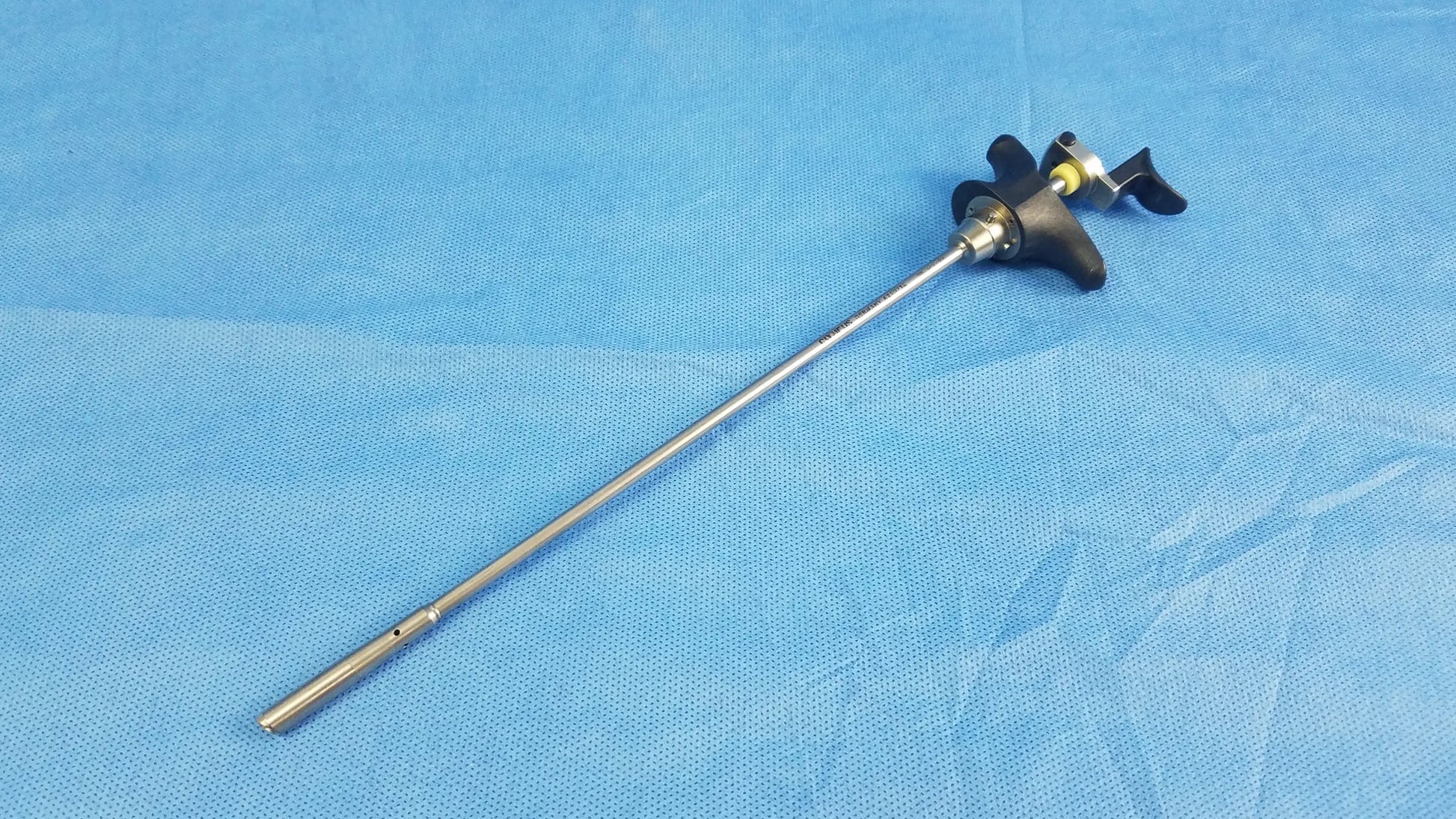 Silver surgical endoscope with black ergonomic handle and yellow accents for visual optical obturator by Olympus A22071A