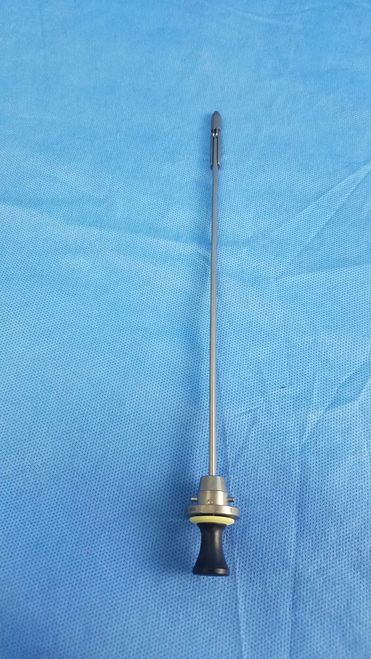 Silver deflecting obturator instrument component with black ergonomic handle and metallic shaft compatible olympus a22085a