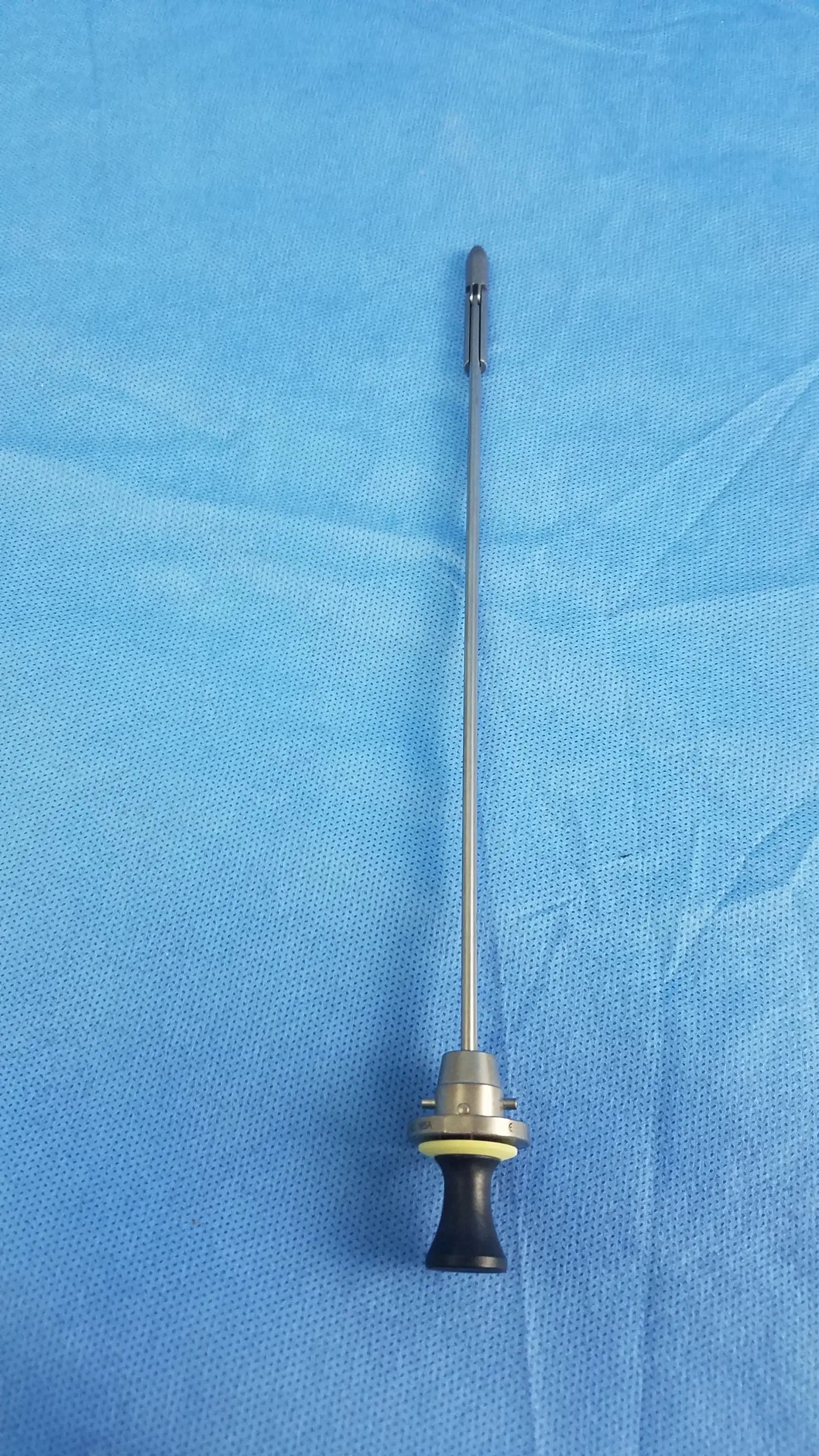 Silver deflecting obturator instrument component with black ergonomic handle and metallic shaft compatible olympus a22085a