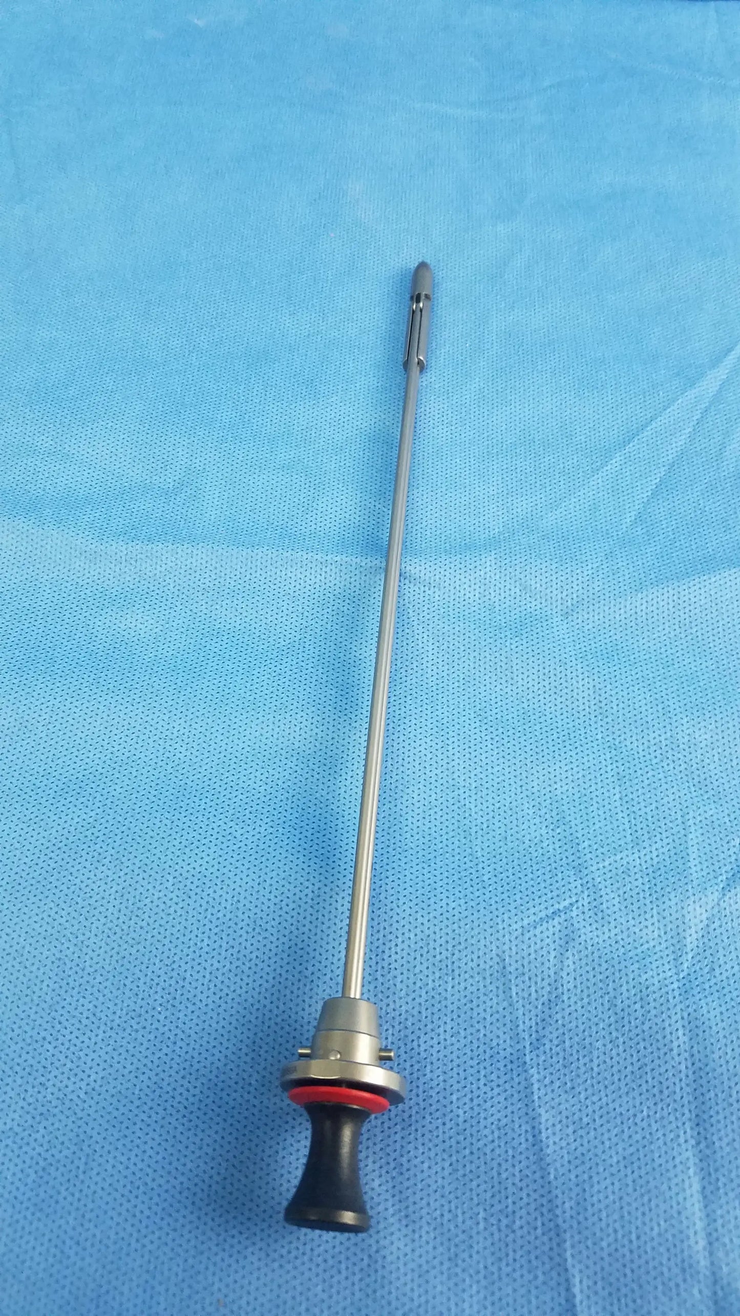 Olympus A22086A deflecting obturator surgical instrument with silver shaft black handle and red ring compatible Olympus
