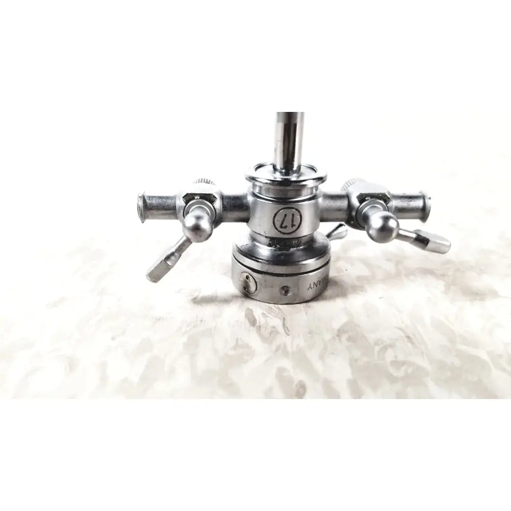Silver metallic olympus a2211 dual valve sheath 17 fr instrument with three adjustable knobs and engraved markings