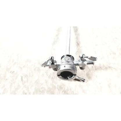 Silver stainless steel olympus a2211 dual valve sheath with central shaft and engraved branding surgical instrument