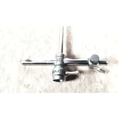 Silver olympus a3173 sheath surgical instrument with textured handle and engraved markings for precise use