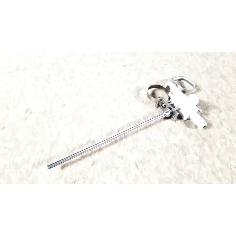 Silver metallic olympus a3176 laparoscopic pediatric iglesias endoscope with white plastic handle and metal clamps