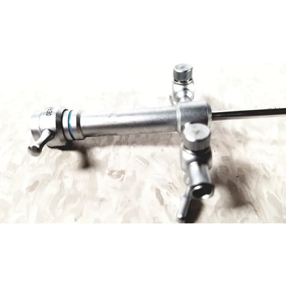 Silver metallic olympus a3721 pediatric sheath with slender shaft and multiple adjustable knobs for dual port use