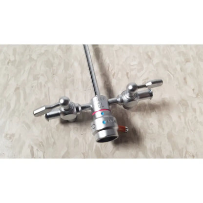 Silver surgical instrument with long shaft and three adjustable knobs in olympus a3722 pediatric sheath 13 fr instrument