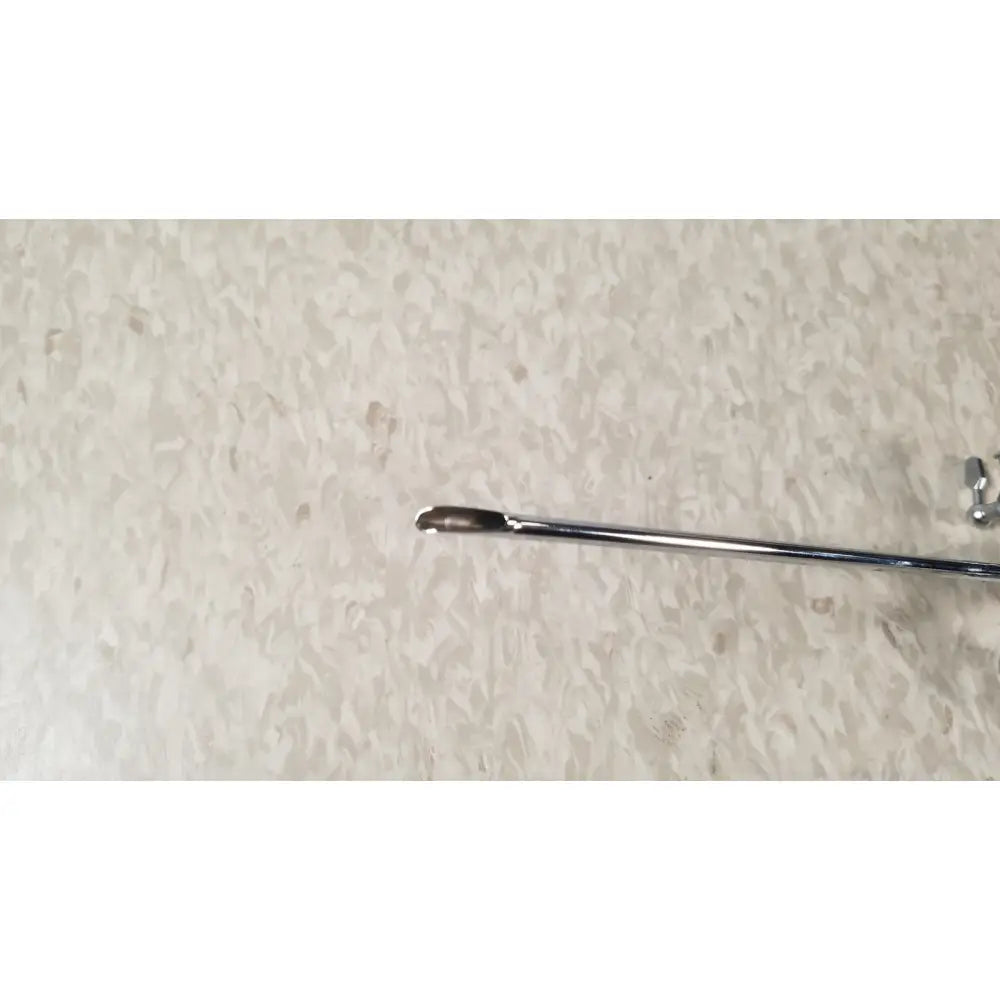 A sleek chrome-finished metal olympus a3722 pediatric sheath with a slender handle and curved tip for medical use