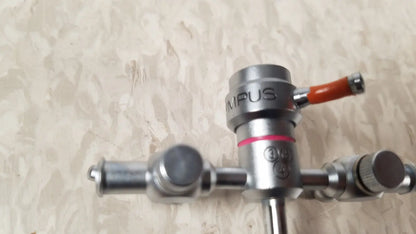 Silver metallic surgical gas valve with orange handle and red accent on olympus a3722 pediatric sheath 13 fr instrument