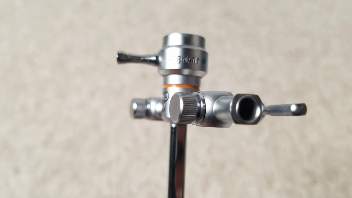 Silver metallic gas regulator with knurled knob and orange band for olympus a3723 pediatric sheath 14 fr instrument