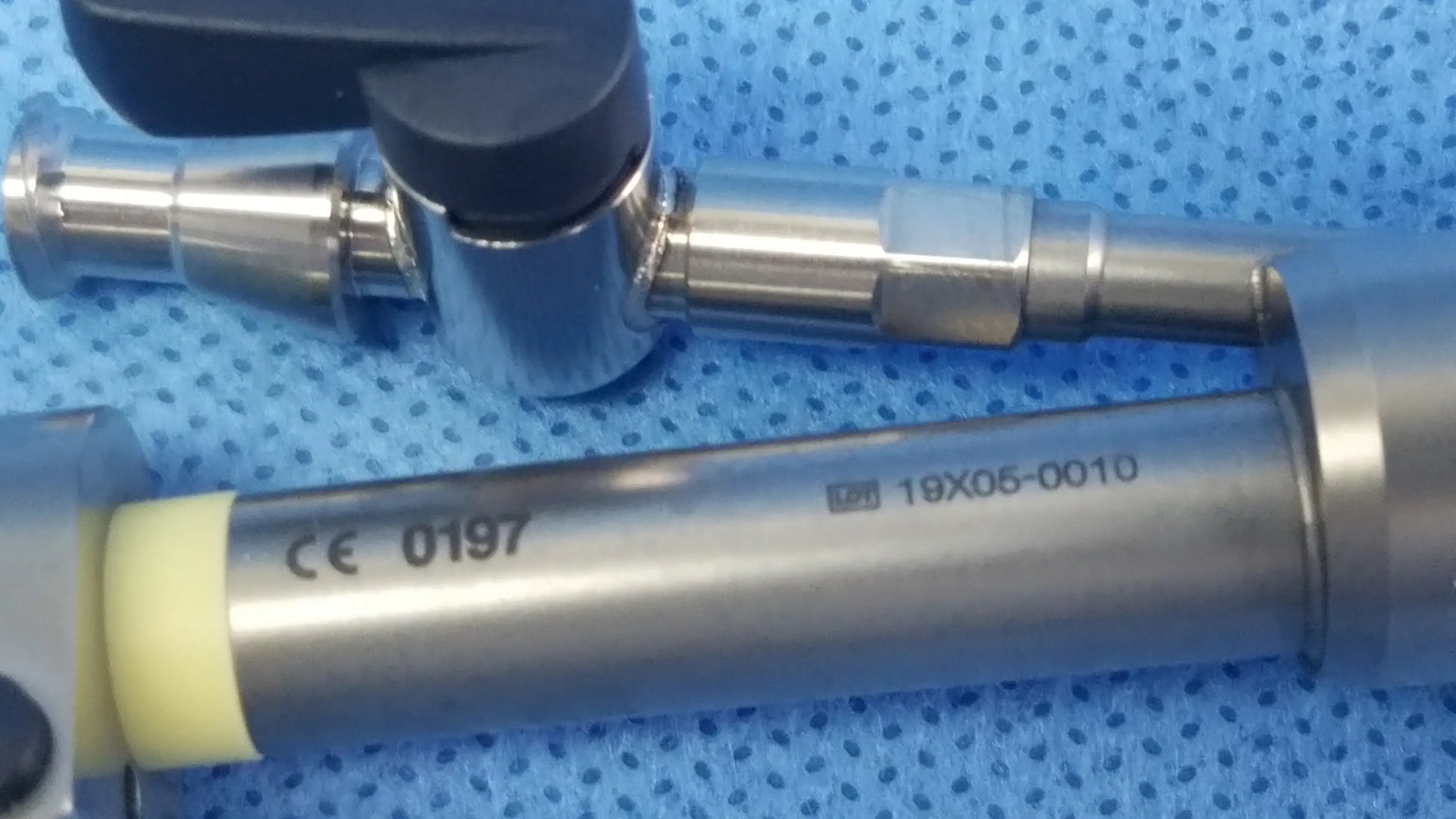 Silver working insert a42091a with black handle and engraved markings for hystero-resectoscope sterilization tray