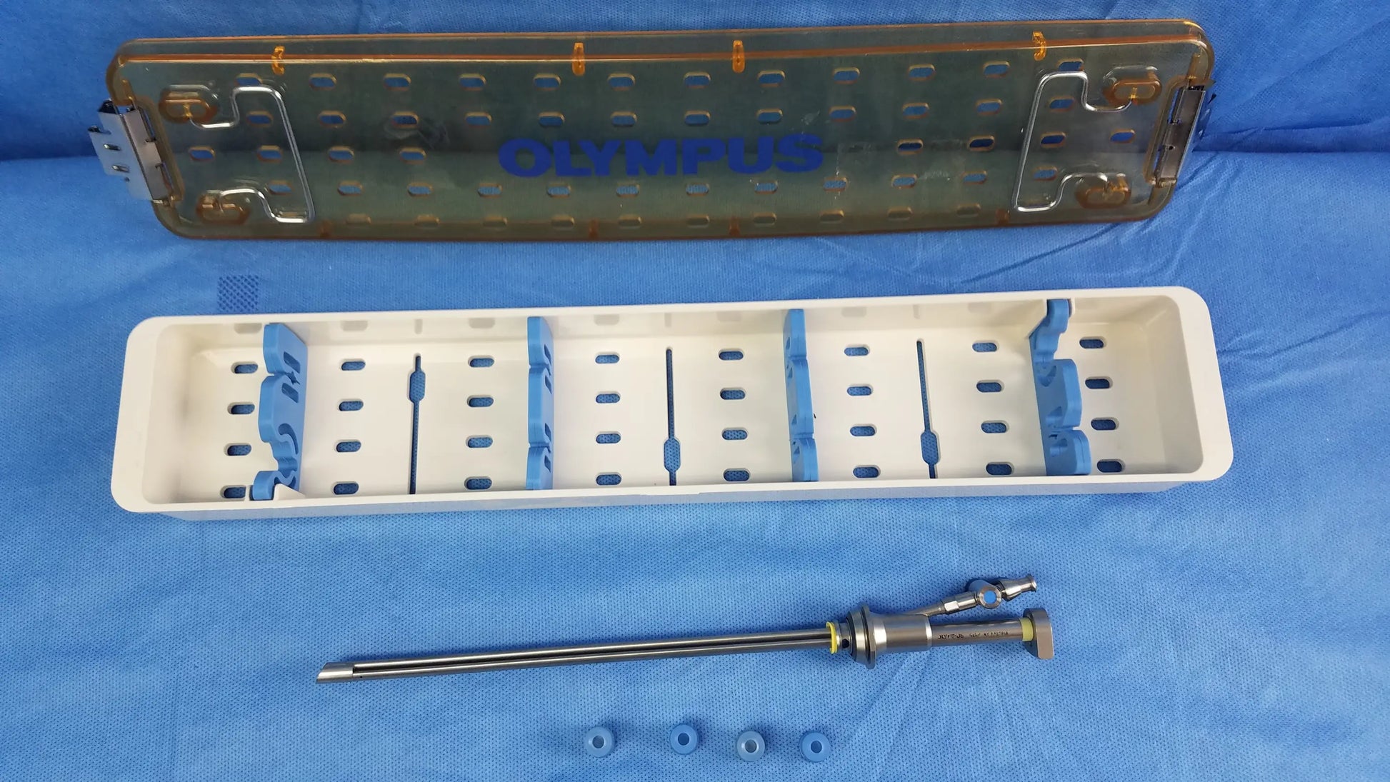 Olympus working insert hystero-resectoscope with sterilization tray featuring gyrus acmi silicone seals and blue-tipped accessories