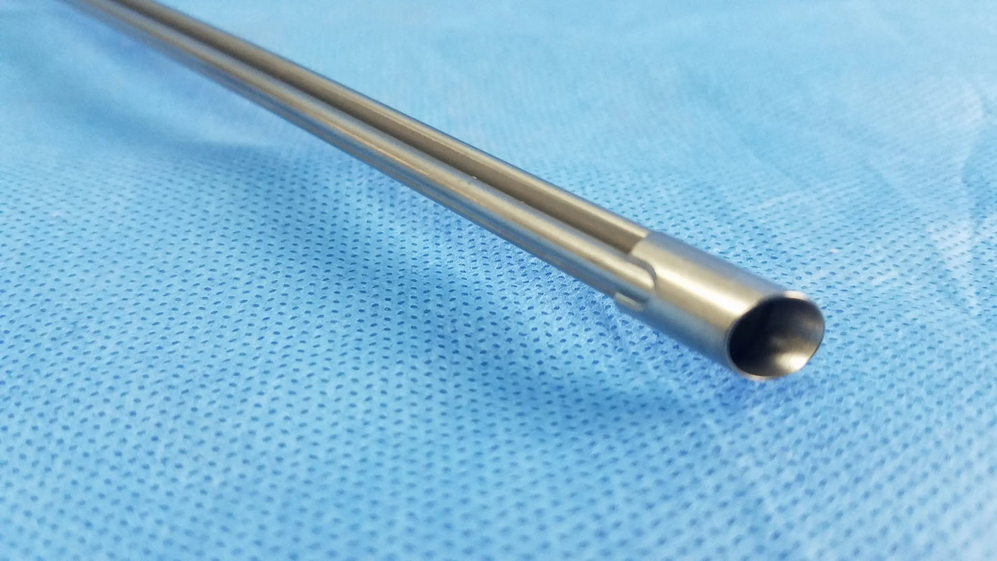 A sleek metallic working insert with polished stainless steel shaft and gyrus acmi silicone seals for hystero-resectoscope use