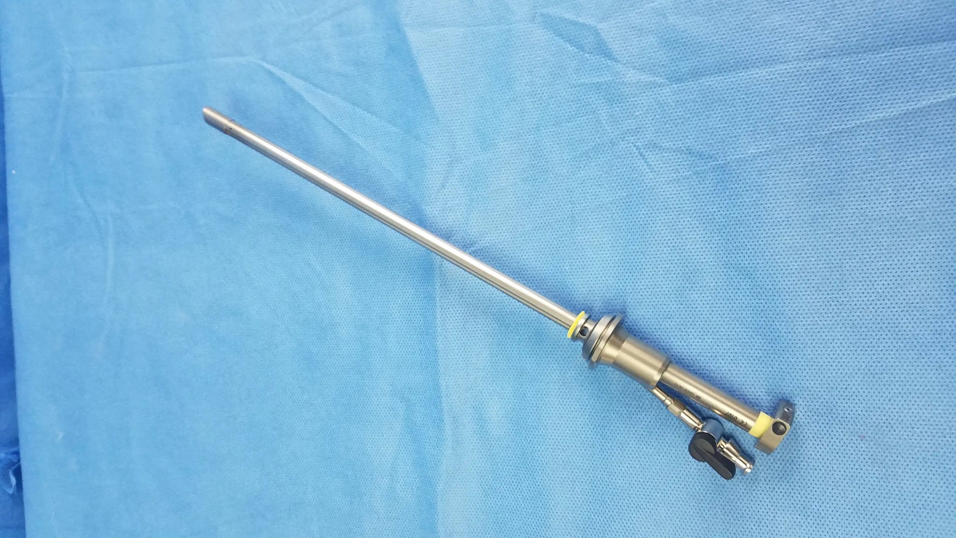Silver metallic working insert a42091a hystero-resectoscope with articulated joints and a sterilization tray