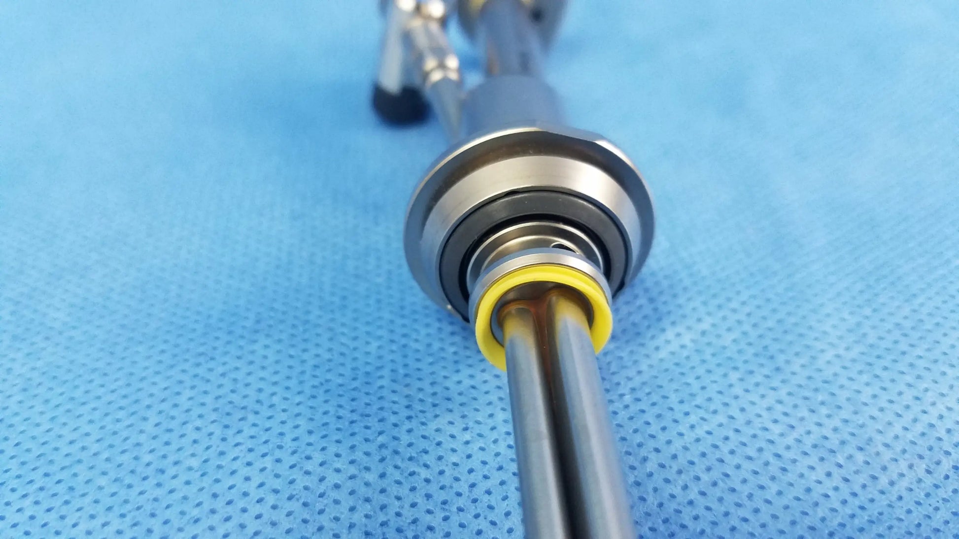 Silver working insert with yellow o-ring and metallic joints featuring gyrus acmi silicone seals for hystero-resectoscope