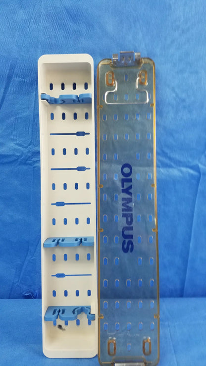 Transparent blue Olympus A42091A working insert hystero-resectoscope sterilization tray with white plastic insert and gold clasps