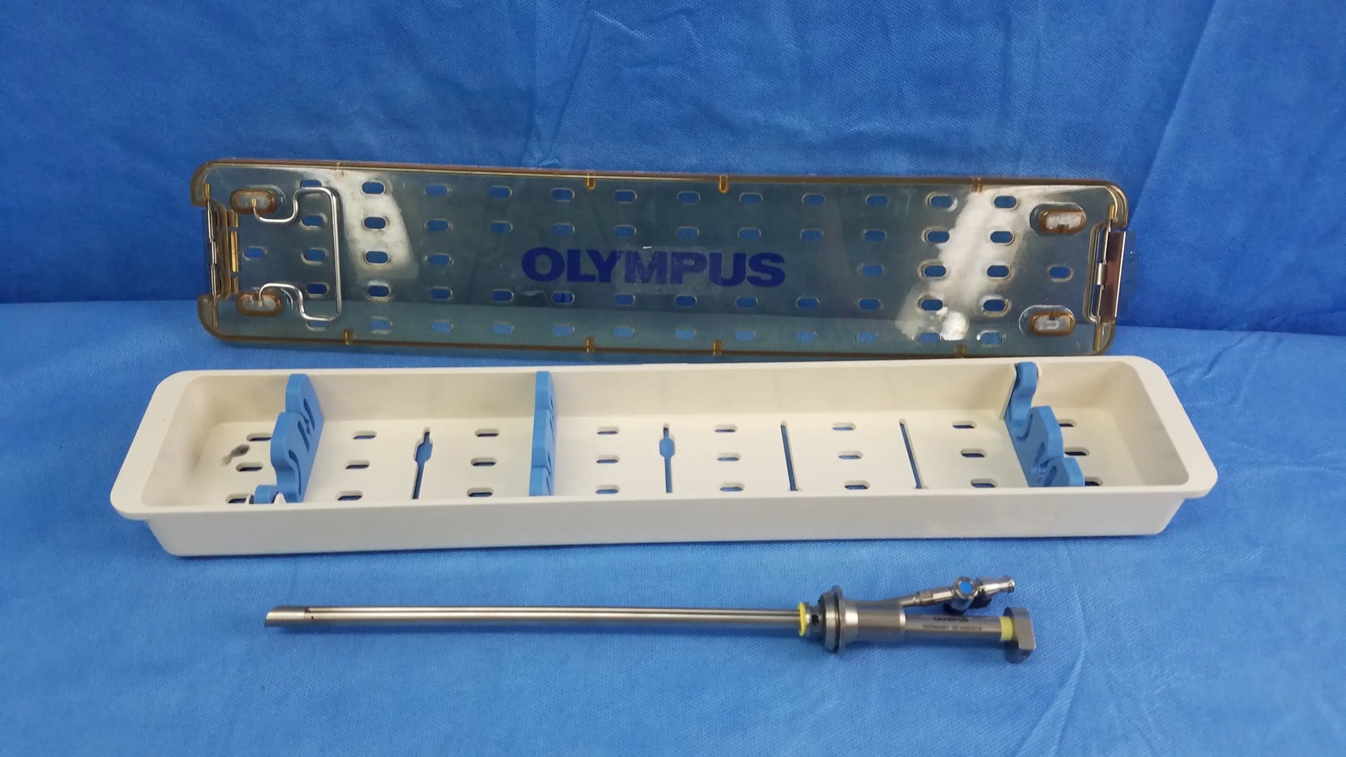 Olympus a42091a working insert hystero-resectoscope with metallic and blue plastic sterilization tray components
