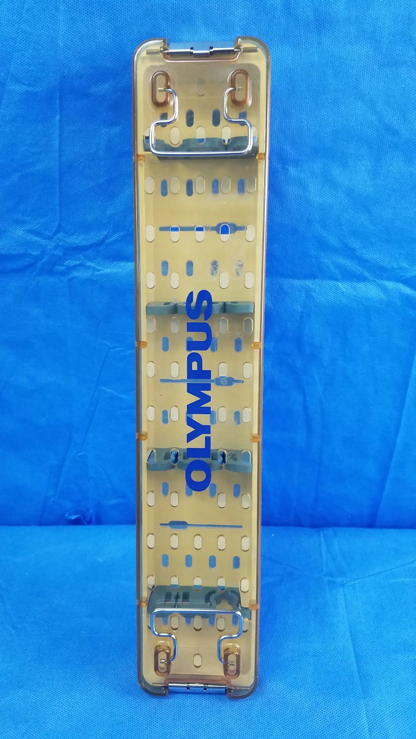 Clear plastic olympus working insert hystero-resectoscope tray with blue branding metal clamps and gyrus acmi silicone seals