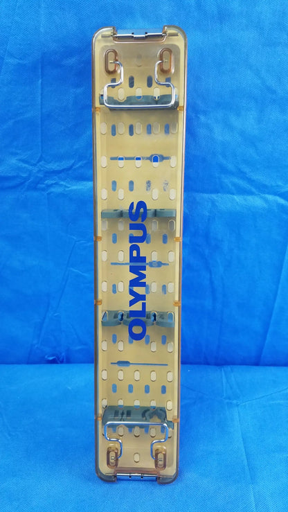Clear plastic olympus working insert hystero-resectoscope tray with blue branding metal clamps and gyrus acmi silicone seals